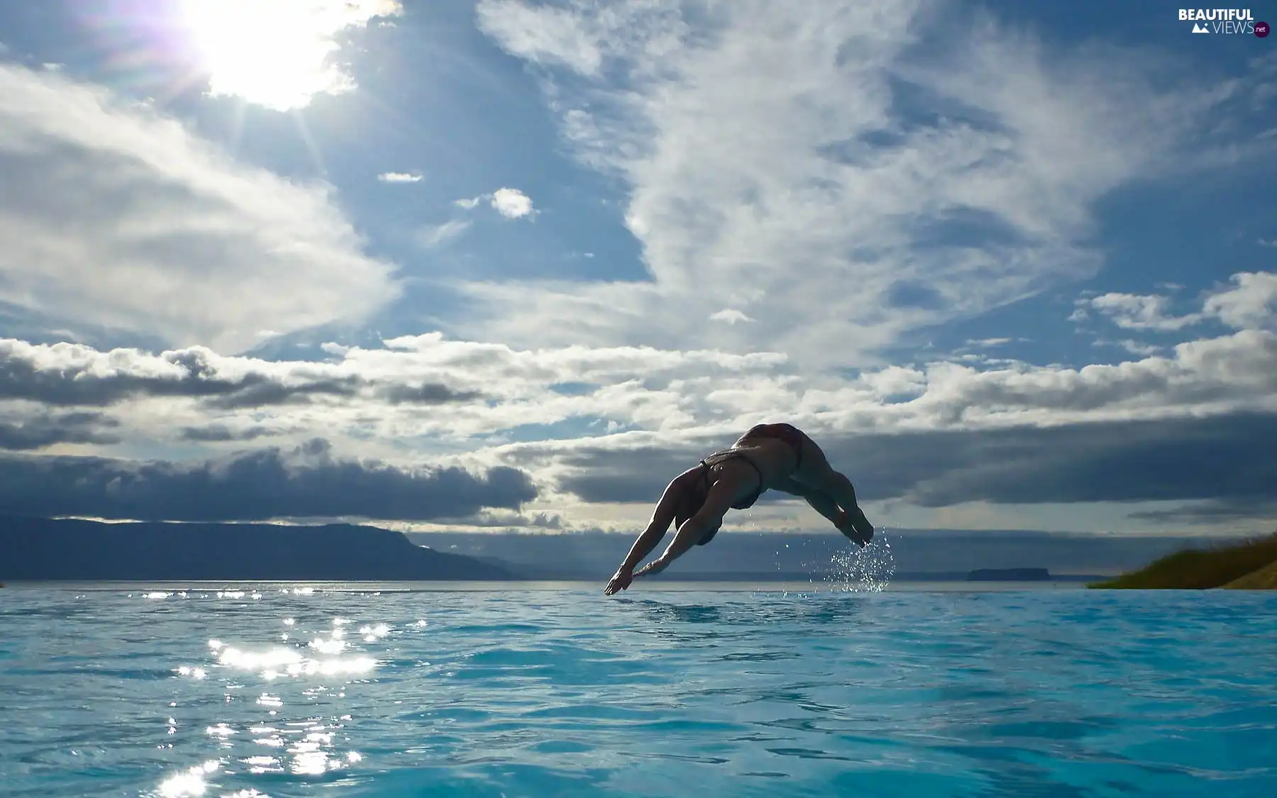 Women, clouds, jump, sea