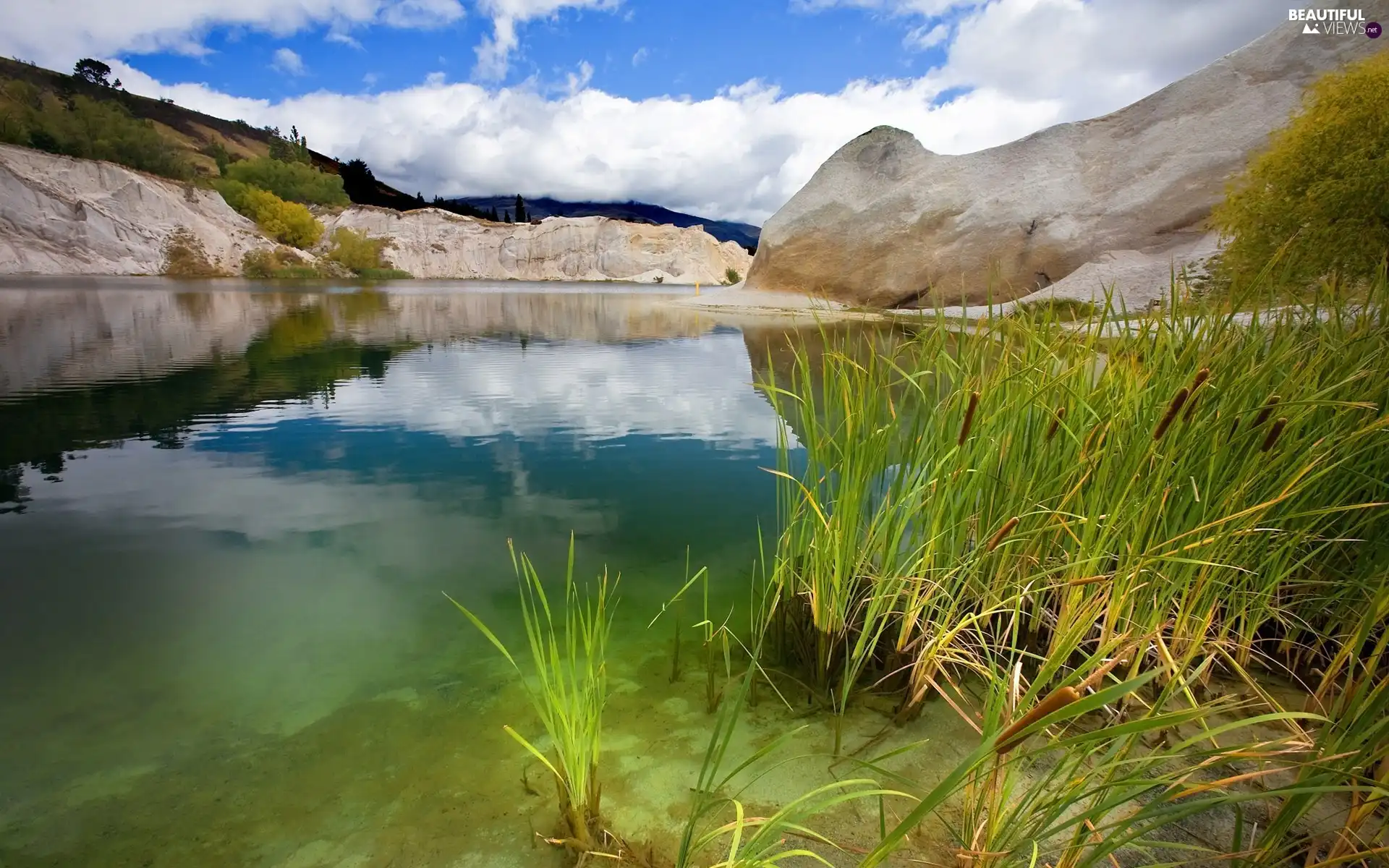 Mallets, water, rocks, rushes, River