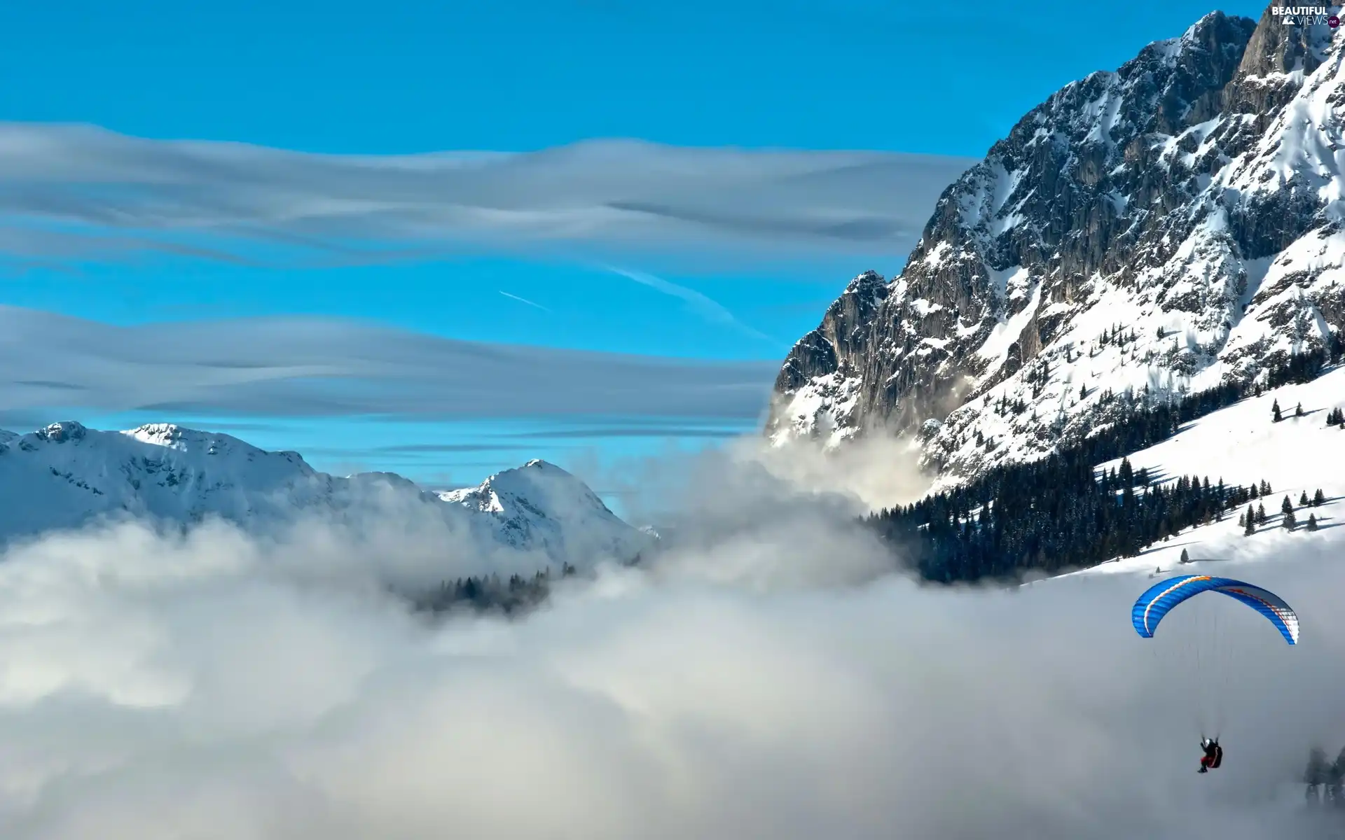 Mountains, clouds, parachutist, layer