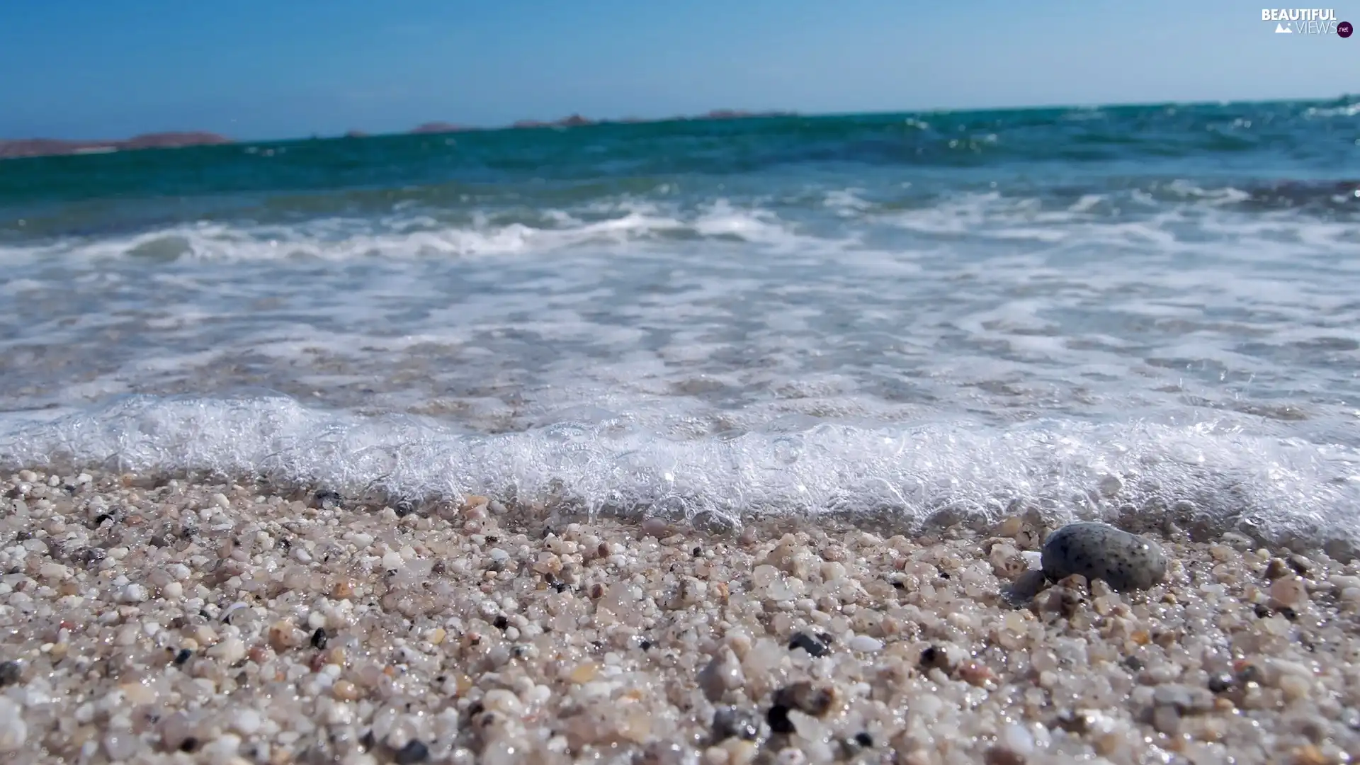 Sand, sea, Waves