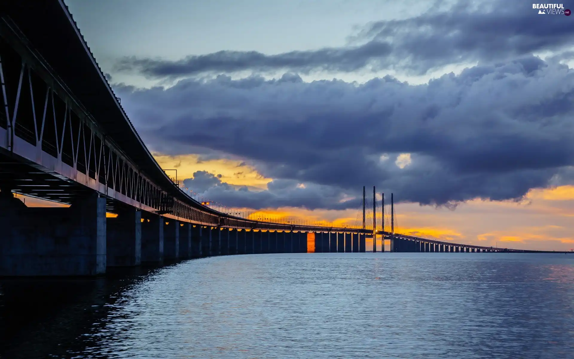 Oresund bridge, clouds, Sund Strait, Denmark, Baltic Sea